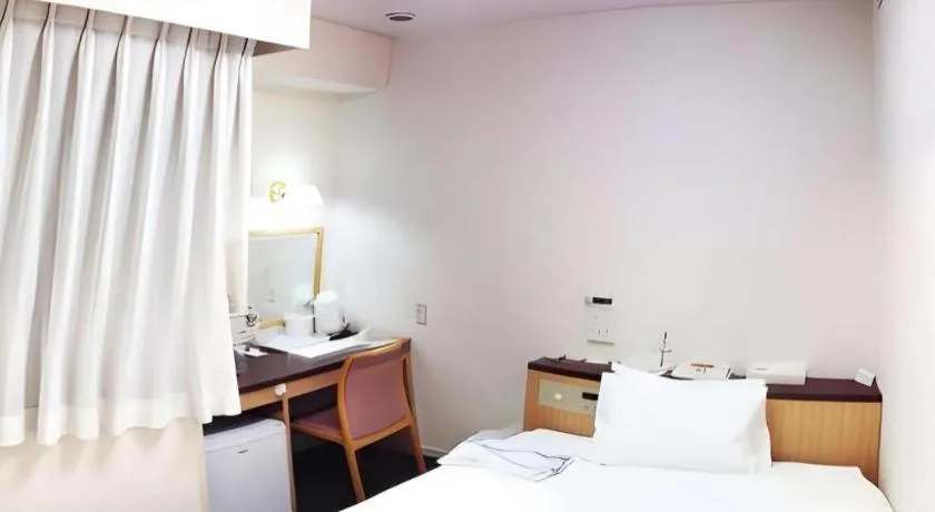 Bed in Pearl Hotel Kawasaki