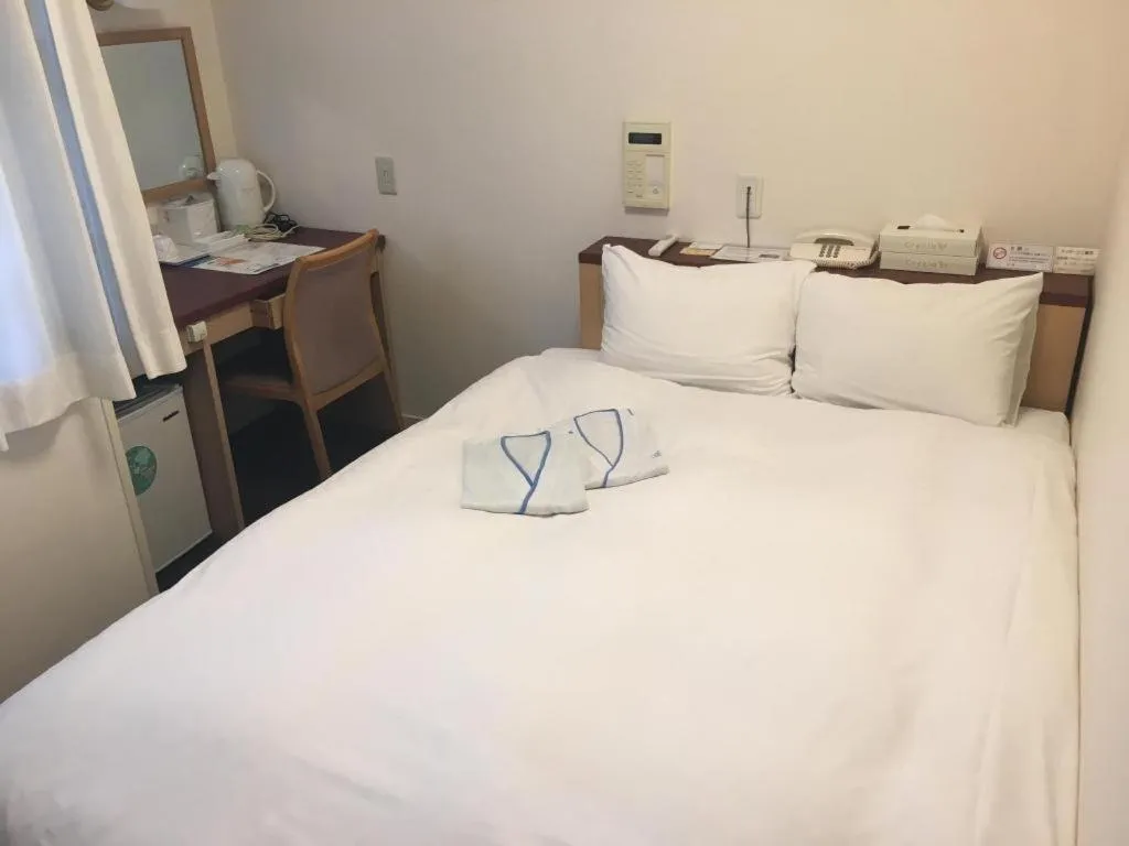 Bed in Pearl Hotel Kawasaki