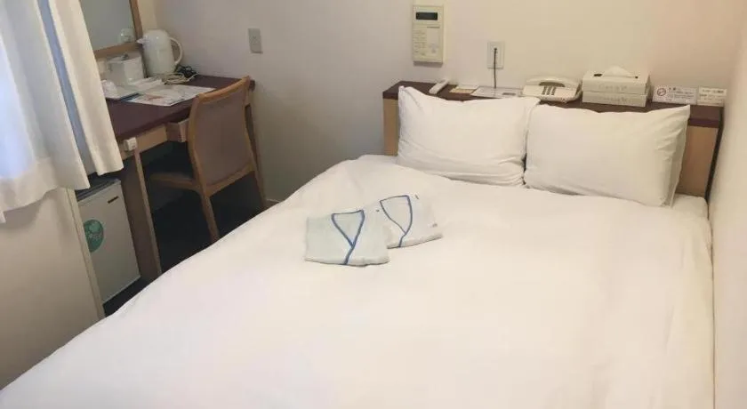 Bed in Pearl Hotel Kawasaki