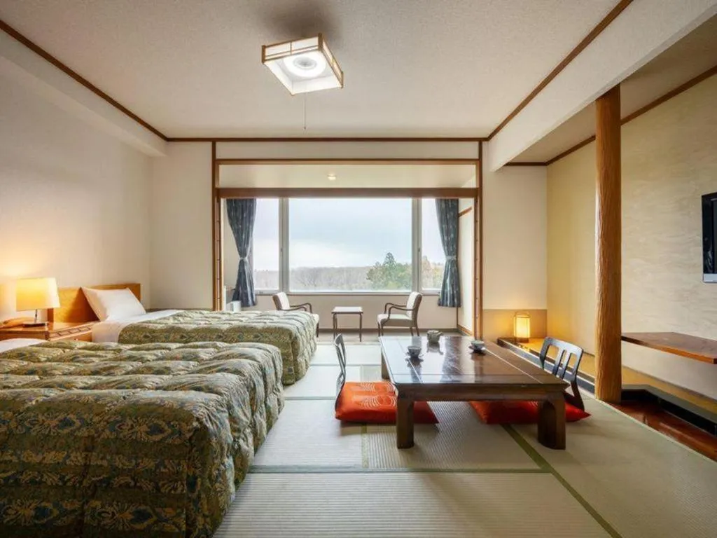 Bed in Oga Kanko Hotel