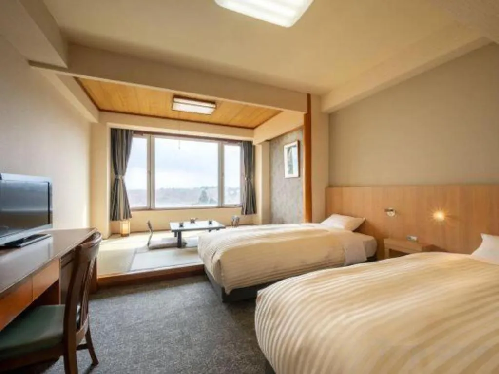 Bed in Oga Kanko Hotel