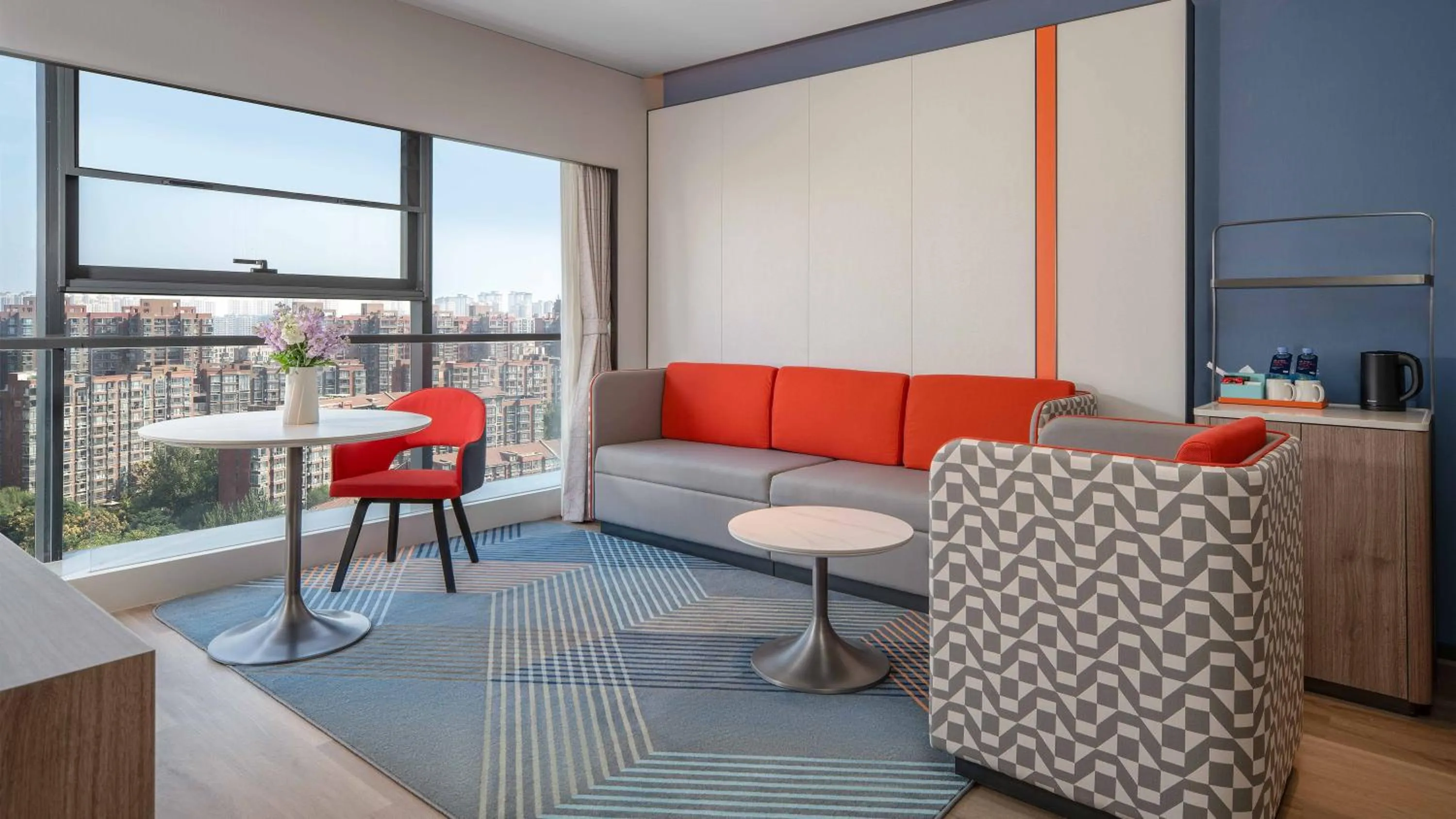 Living room in Holiday Inn Express Xi'an Fengdong by IHG