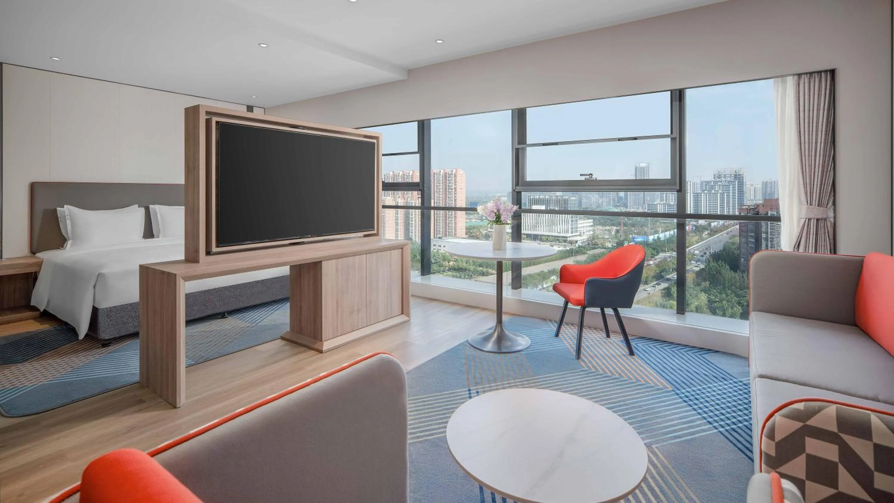 Living room in Holiday Inn Express Xi'an Fengdong by IHG