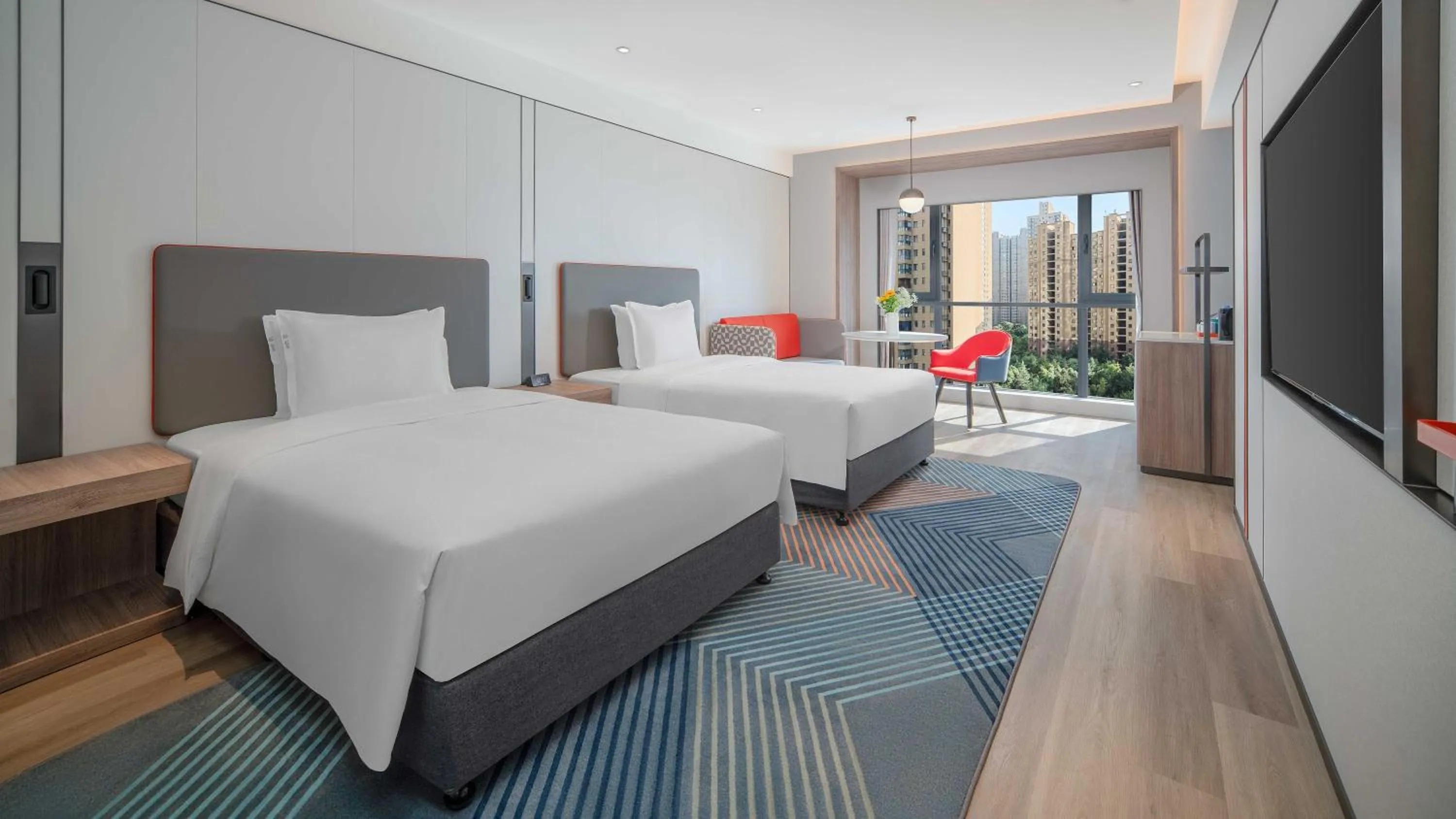 Bed in Holiday Inn Express Xi'an Fengdong by IHG