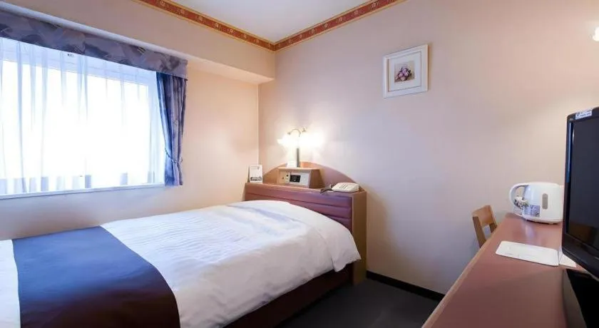 Bed in Hotel Starplaza Ikebukuro