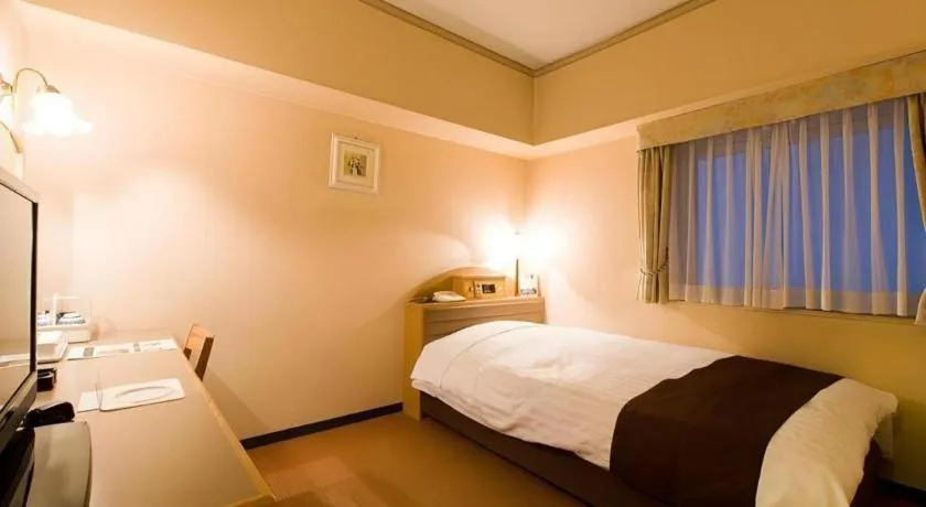 Bed in Hotel Starplaza Ikebukuro