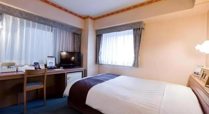 Bed in Hotel Starplaza Ikebukuro