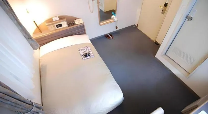 Bed in Hotel Starplaza Ikebukuro