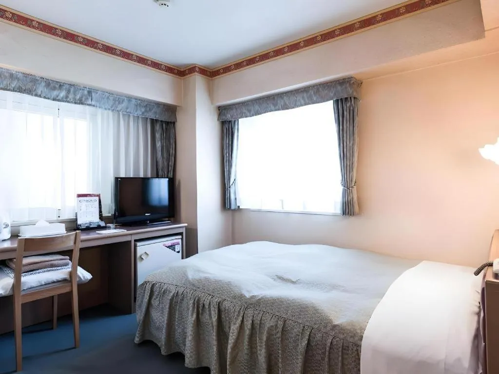 Bed in Hotel Starplaza Ikebukuro