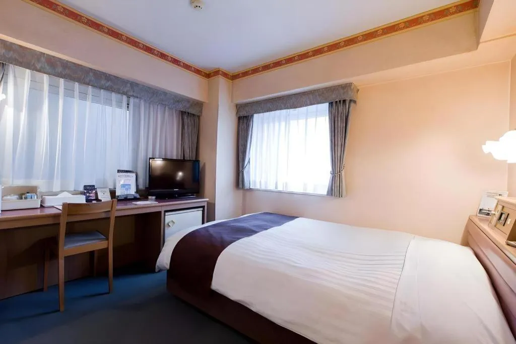 Bed in Hotel Starplaza Ikebukuro