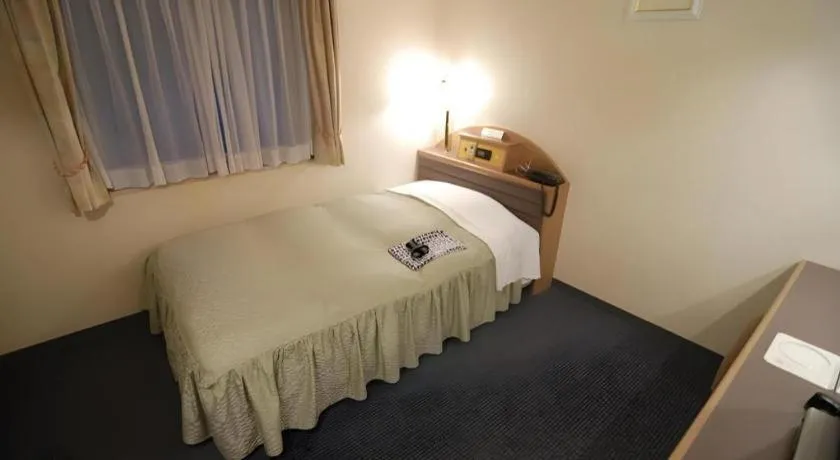 Bed in Hotel Starplaza Ikebukuro