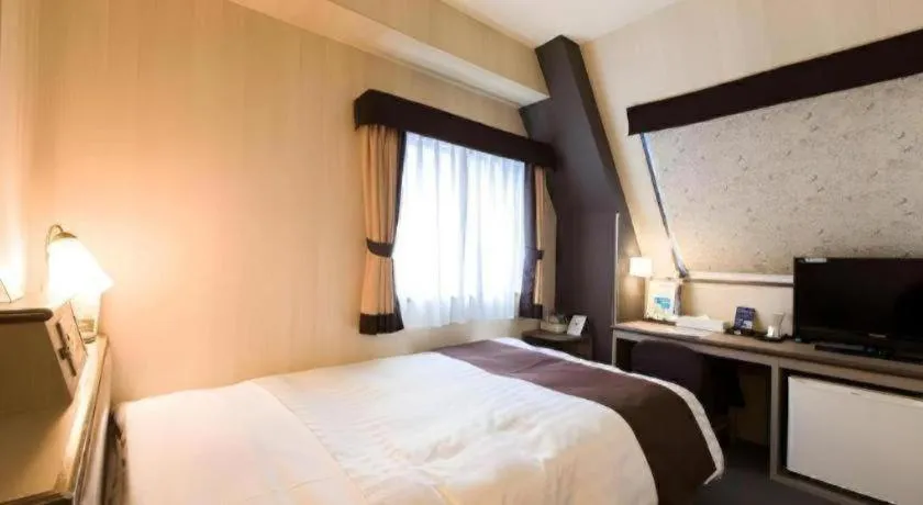 Bed in Hotel Starplaza Ikebukuro