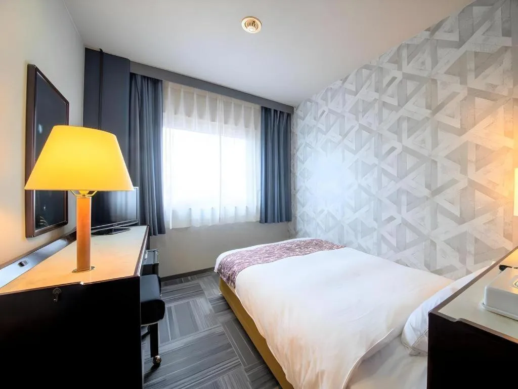 Bed in Hotel Anesis Seto-Ohashi