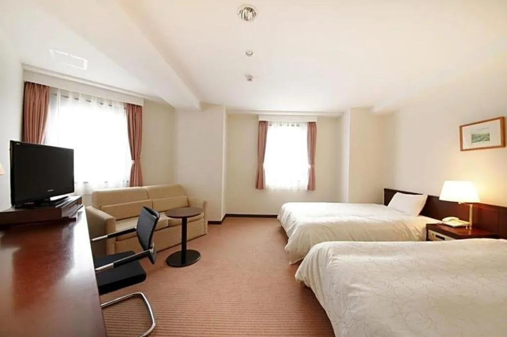 Bed in Sotetsu Fresa Inn Nagano eki Higashiguhci