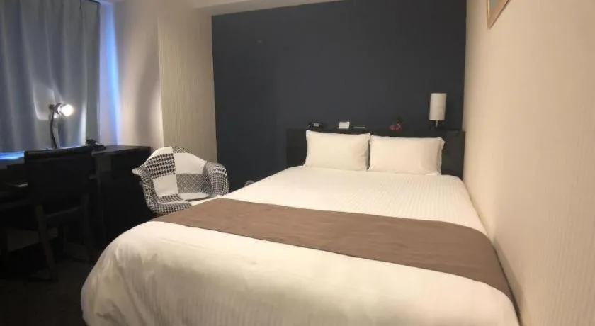 Bed in Hotel Bougainvillea Akebonobashi