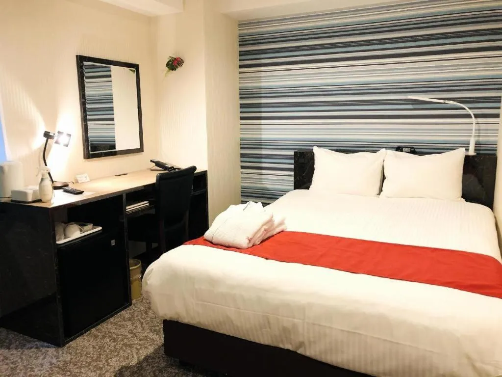 Bed in Hotel Bougainvillea Akebonobashi