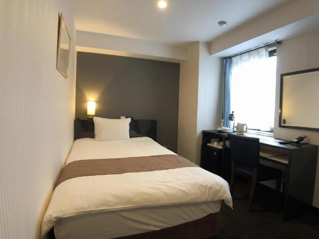 Bed in Hotel Bougainvillea Akebonobashi