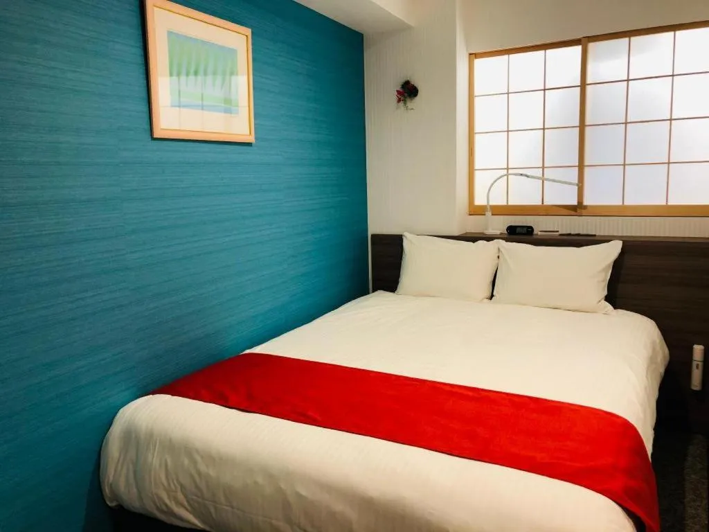 Bed in Hotel Bougainvillea Akebonobashi