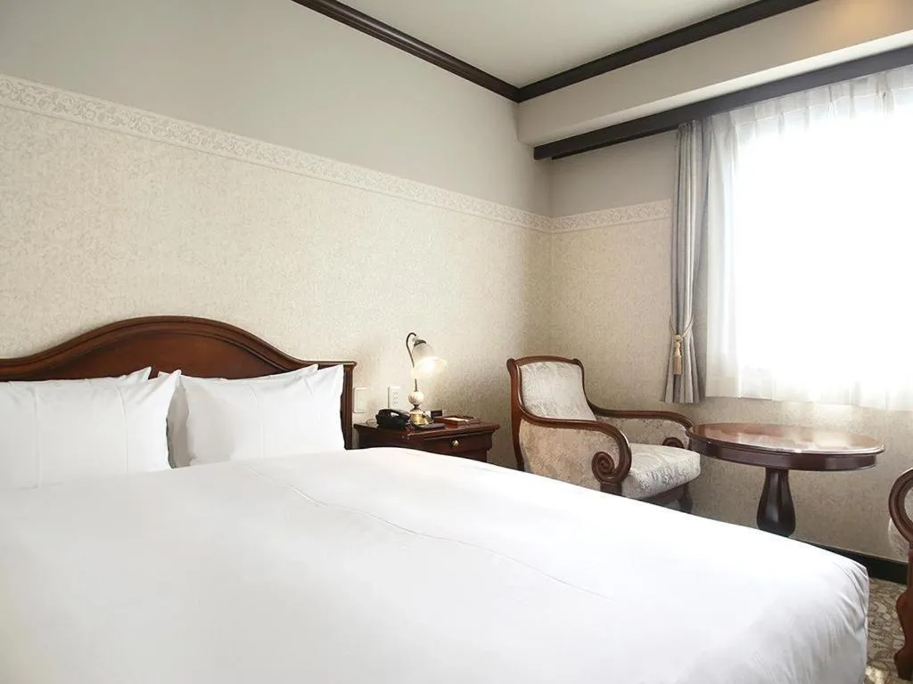 Bed in Hotel Piena Kobe