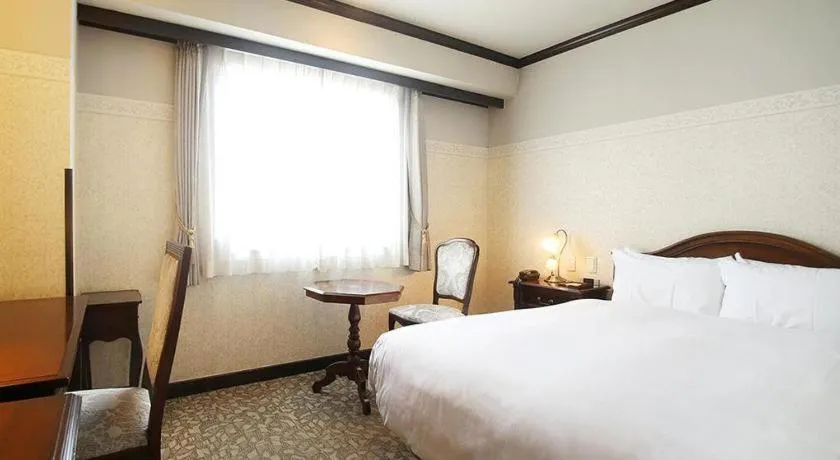 Bed in Hotel Piena Kobe