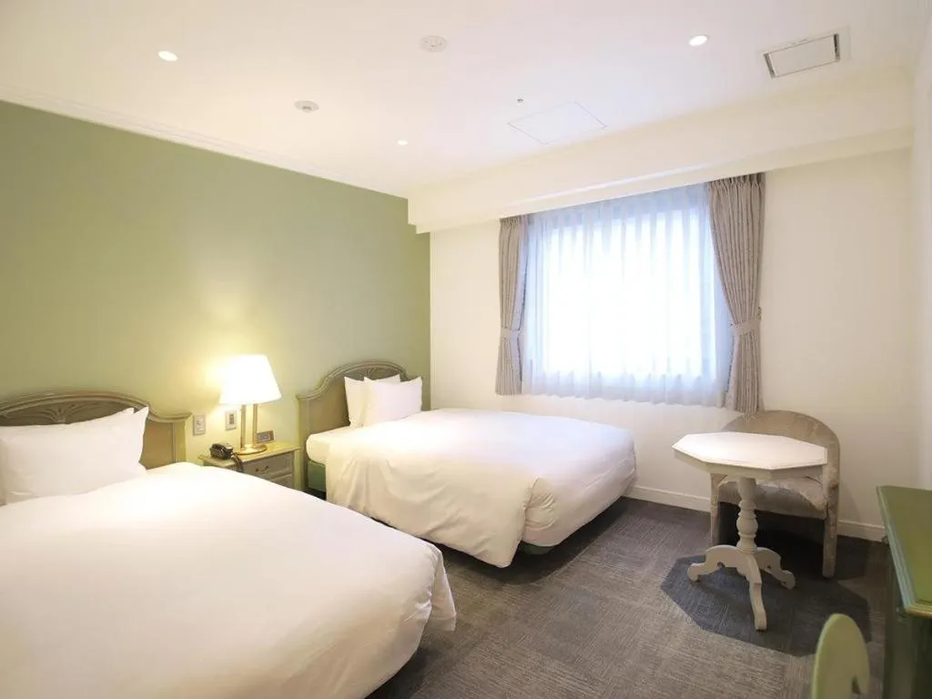 Bed in Hotel Piena Kobe