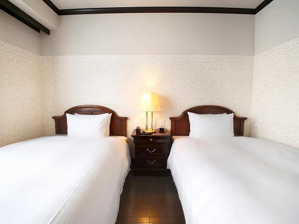 Bed in Hotel Piena Kobe