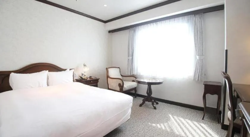 Bed in Hotel Piena Kobe