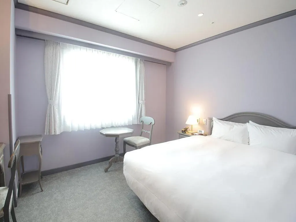 Bed in Hotel Piena Kobe