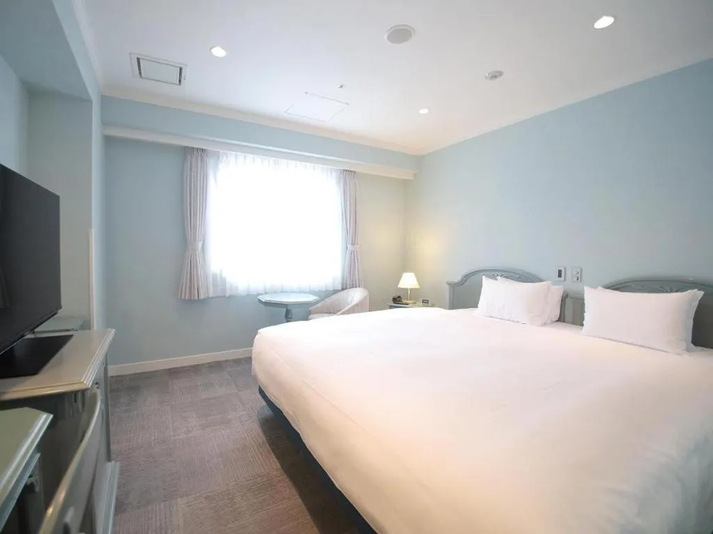 Bed in Hotel Piena Kobe