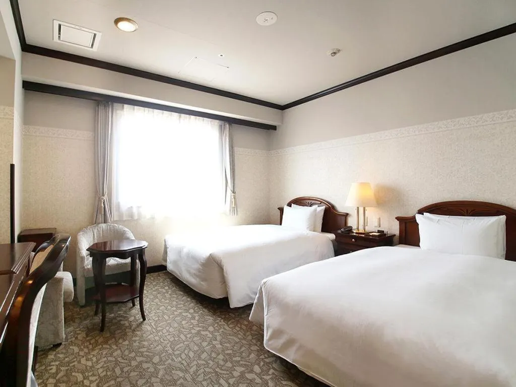 Bed in Hotel Piena Kobe