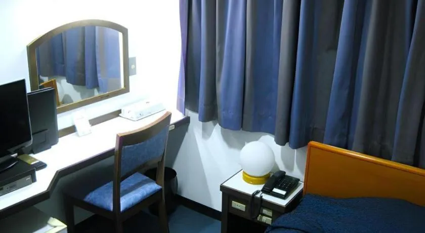 Bed in Tokyo Business Hotel