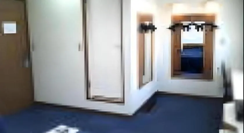 Bed in Tokyo Business Hotel