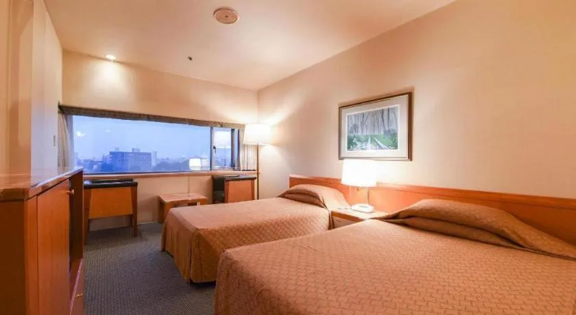 Bed in Gunma Royal Hotel