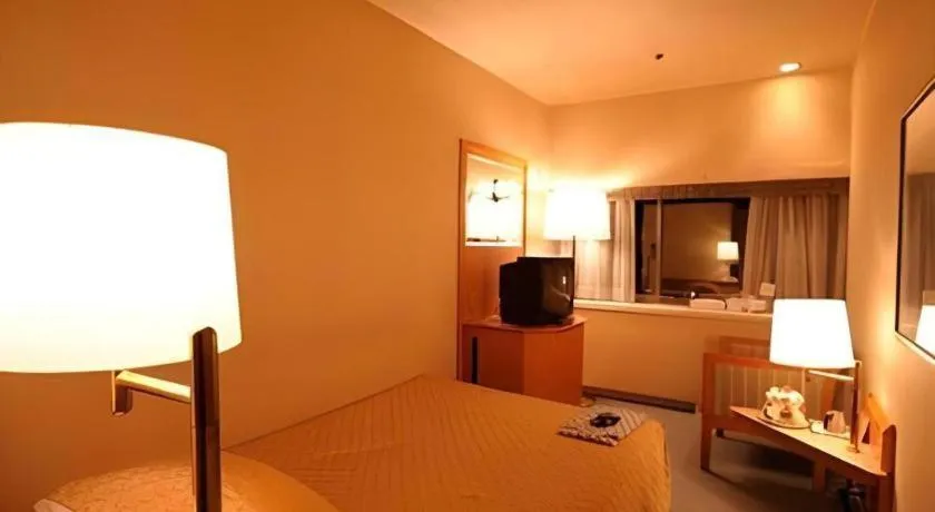 Bed in Gunma Royal Hotel