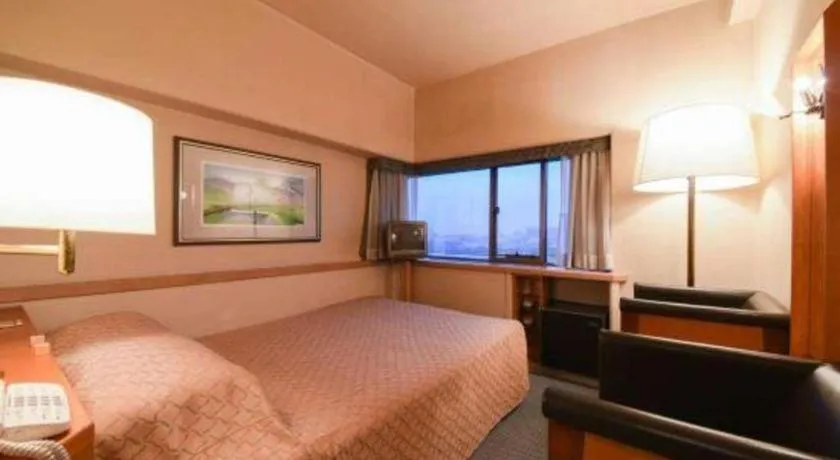 Bed in Gunma Royal Hotel