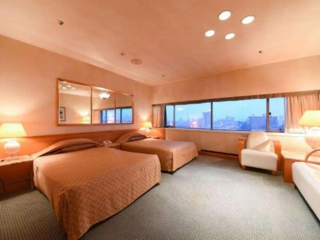 Bed in Gunma Royal Hotel
