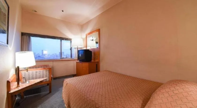 Bed in Gunma Royal Hotel