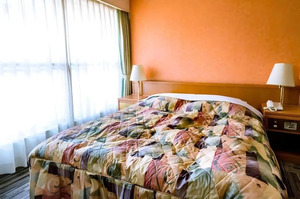 Bed in Kokura Recent Hotel