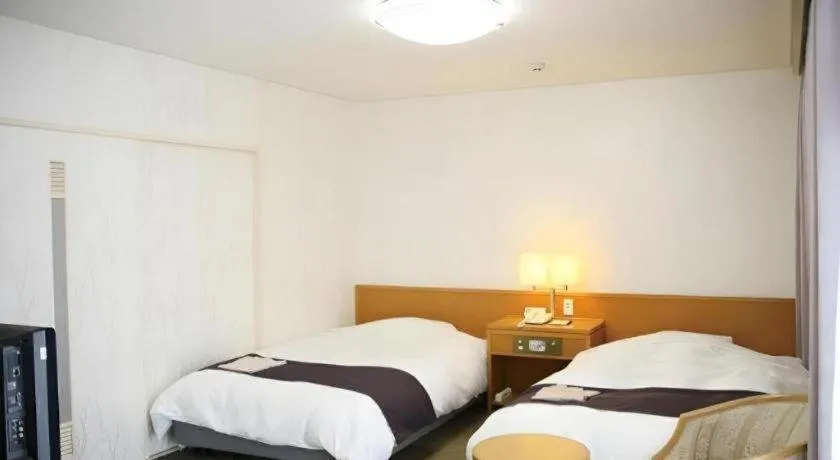 Bed in Kokura Recent Hotel