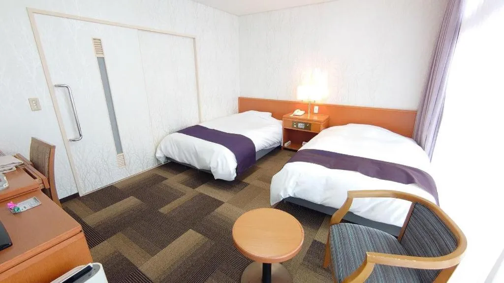 Bed in Kokura Recent Hotel