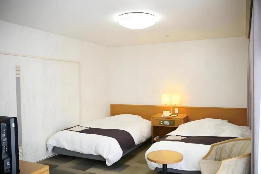 Bed in Kokura Recent Hotel