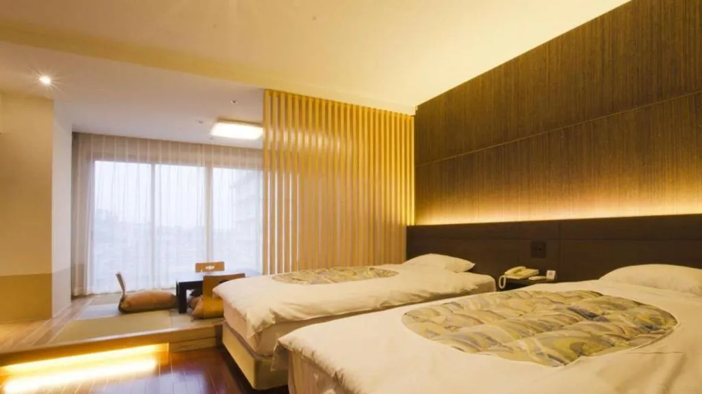Bed in Kannawa Onsen Hotel Sansuikan