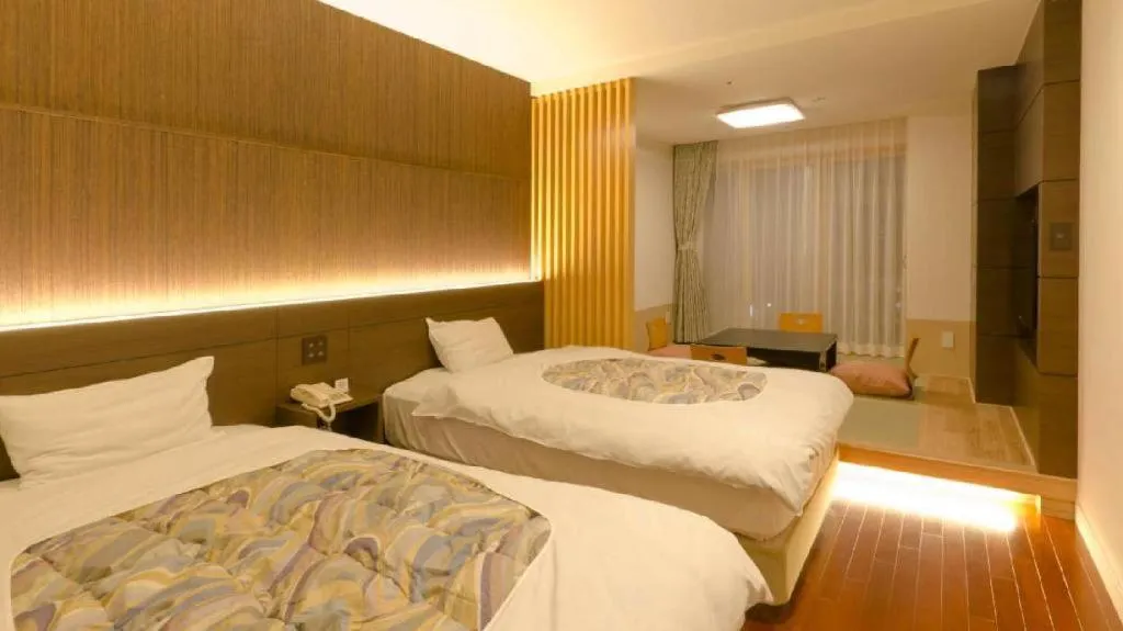 Bed in Kannawa Onsen Hotel Sansuikan