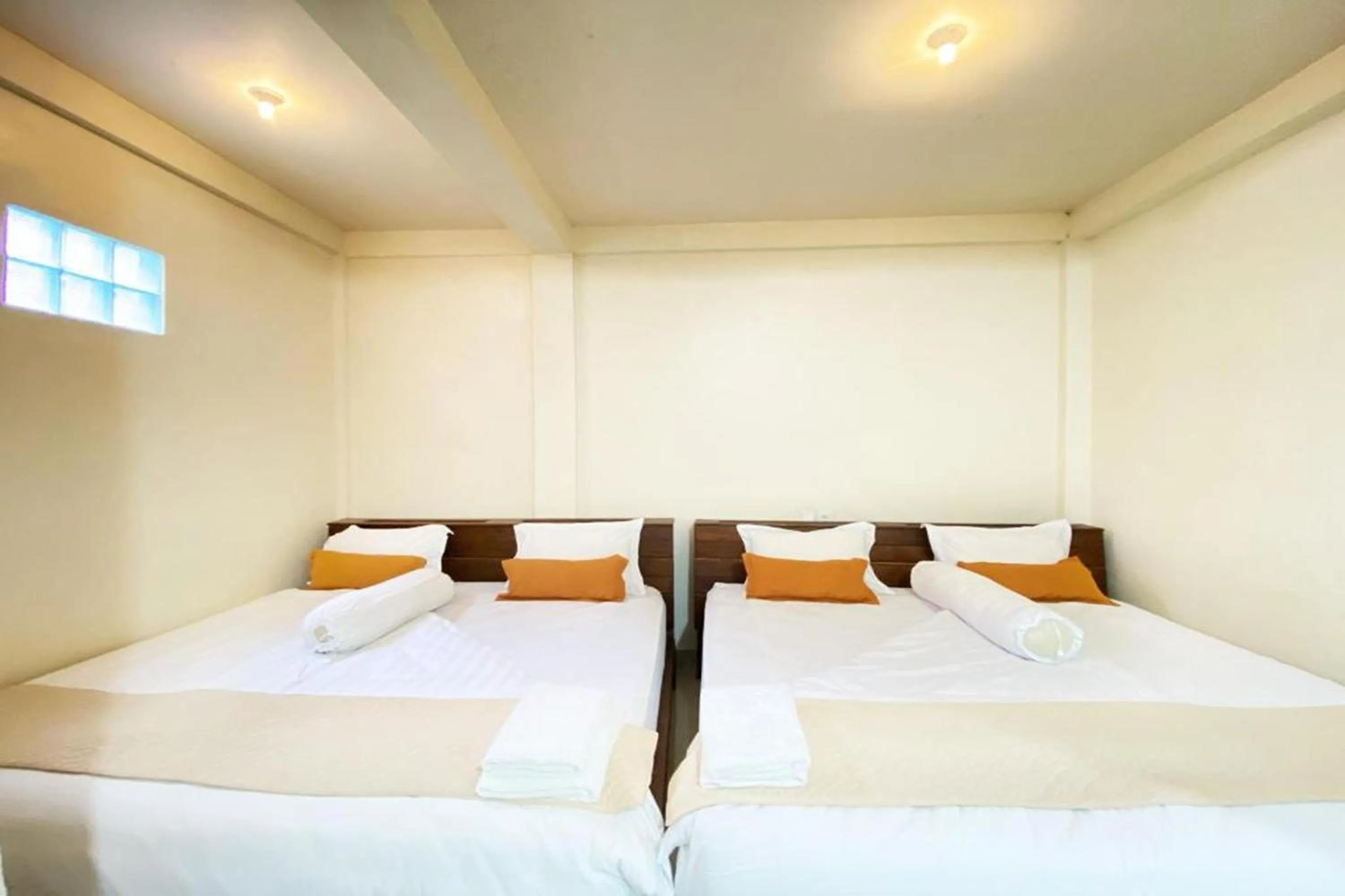 Bed in Bujai Mentawai Griya Hotel
