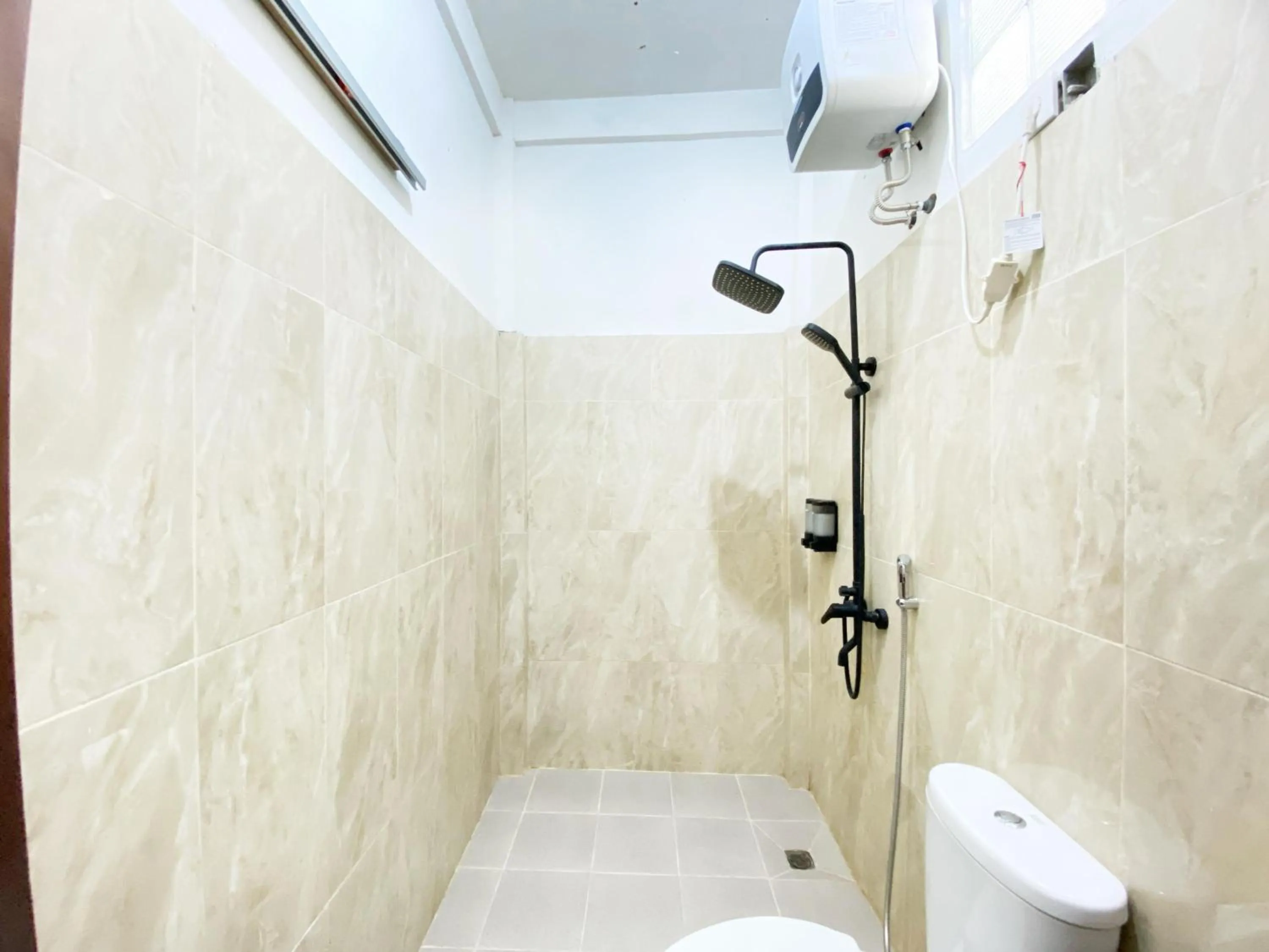 Shower in Bujai Mentawai Griya Hotel