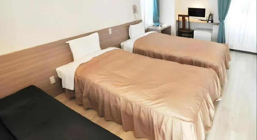 Bed in Hotel Tetora Tsurumi