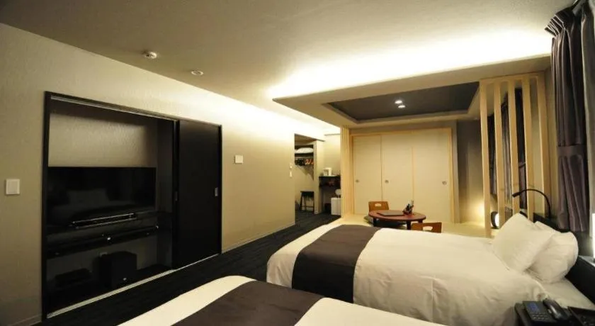 Bed in Hotel Obokekyo Mannaka