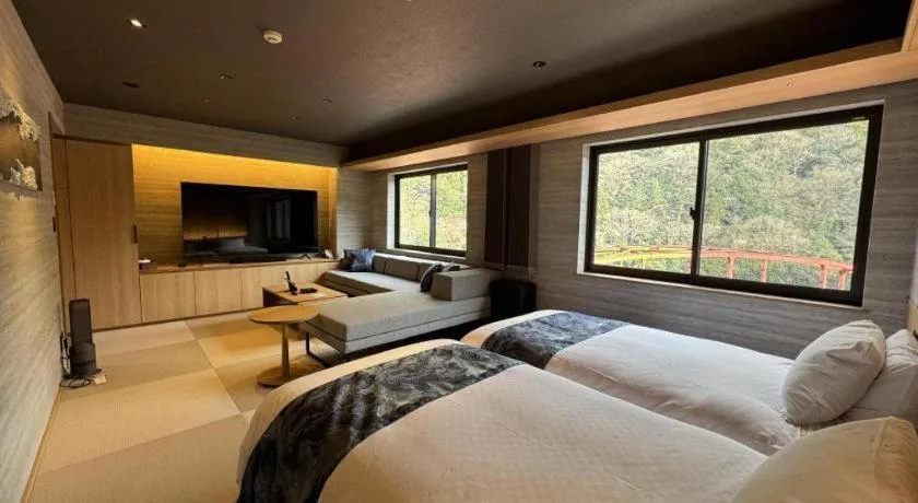 Bed in Hotel Obokekyo Mannaka