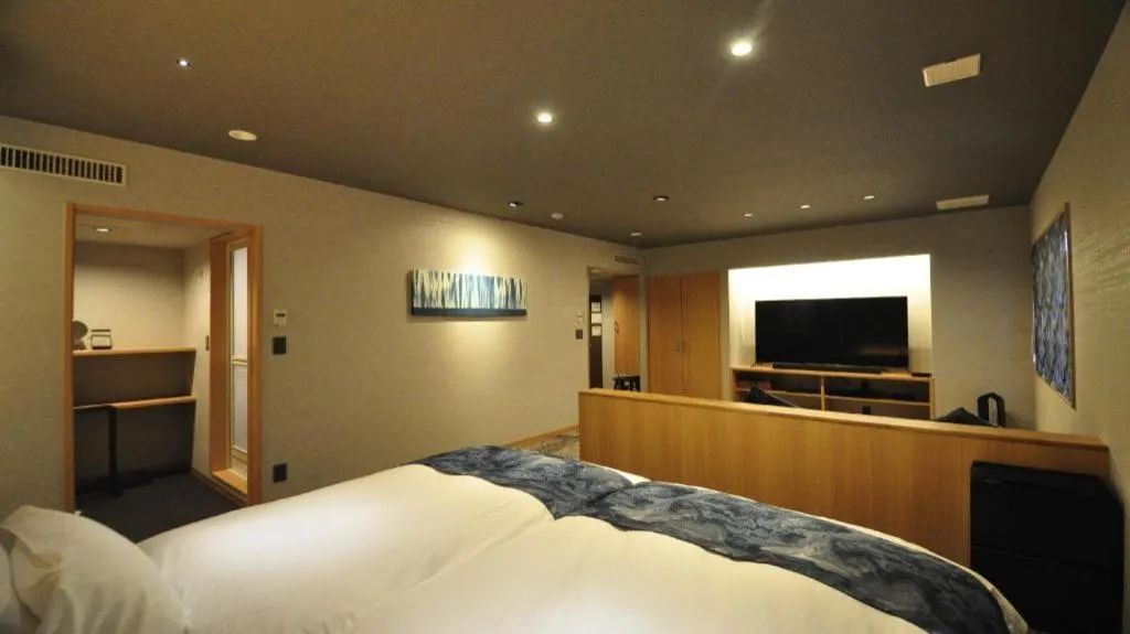 Bed in Hotel Obokekyo Mannaka