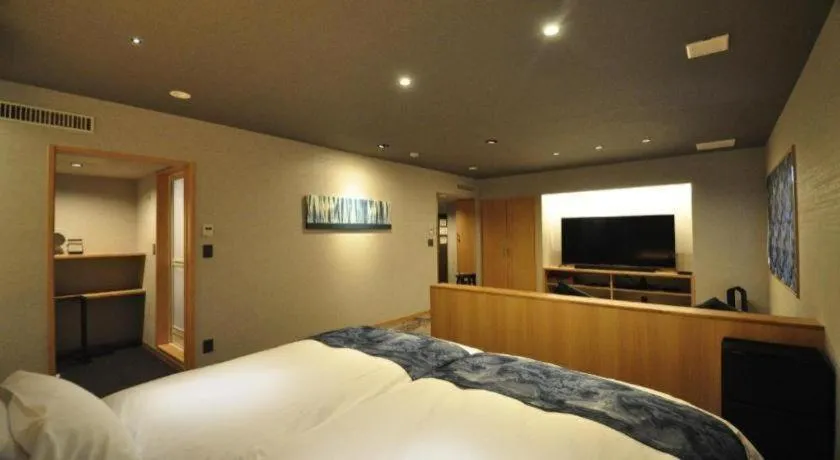 Bed in Hotel Obokekyo Mannaka